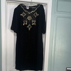 Chic Black Dress with Gold Accents